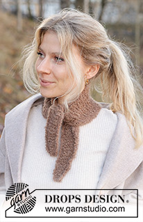 Autumn Leaves Shawl / DROPS 234-83 - Gebreide omslagdoek in DROPS Alpaca Bouclé en DROPS Kid-Silk. Het werk wordt overdwars en heen en weer gebreid.