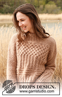 Cracked Walnuts Sweater / DROPS 235-1 - Alhaalta ylös neulottu pusero DROPS Kid-Silk- ja DROPS Puna- / DROPS Merino Extra Fine -langoista. Työssä on kohoneuletta, ainaoikeinneuletta, palmikoita, kaksinkertainen pääntien reunus ja joustinneuletta. Koot XS - XXL.