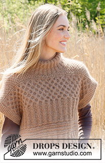 Cracked Walnuts Short Sleeve / DROPS 237-9 - Strikket vest i DROPS Kid-Silk og DROPS Puna / DROPS Merino Extra Fine. Arbeidet strikkes nedenfra og opp med strukturmønster, riller, fletter, dobbel hals og vrangbord. Størrelse XS - XXL.