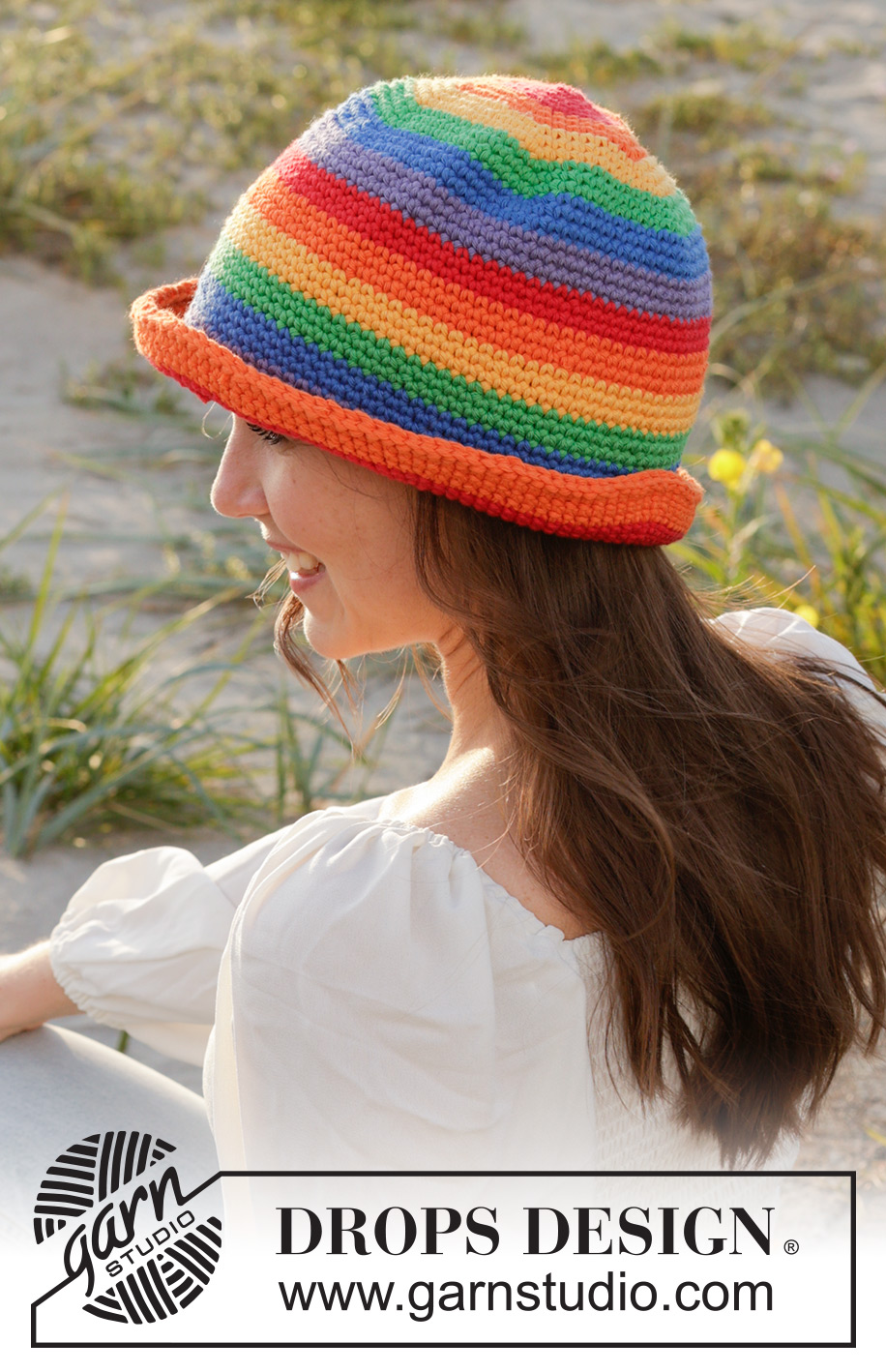Double Rainbow Hat / DROPS 238-20 - Gehaakte hoed in DROPS Paris. Het werk wordt in de rondte gehaakt, van boven naar beneden, met regenboogstrepen. Maten S - XL.