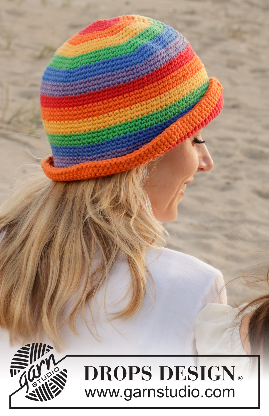 Double Rainbow Hat / DROPS 238-20 - Gehaakte hoed in DROPS Paris. Het werk wordt in de rondte gehaakt, van boven naar beneden, met regenboogstrepen. Maten S - XL.