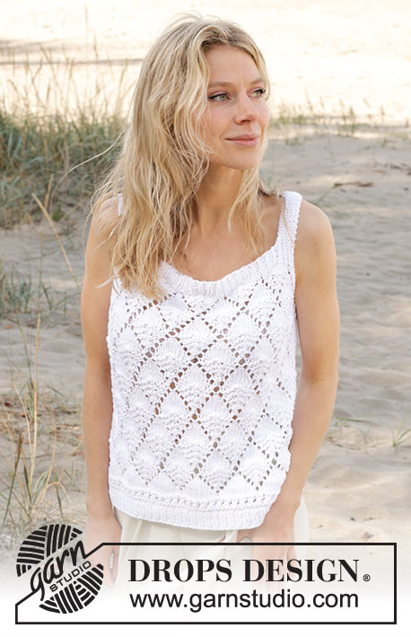 Stormlight Top / DROPS 239-34 - Top tricoté de haut en bas avec point ajouré, point mousse et fentes sur les côtés, en DROPS Paris. Du XS/S au XXXL.