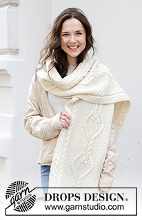 Streets of Vienna / DROPS 242-15 - Knitted scarf in DROPS Puna or DROPS Karisma. The piece is worked back and forth with cables and moss stitch.