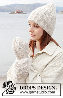 Slalom Slope Mittens / DROPS 242-35 - Knitted mittens with cables in DROPS Soft Tweed and DROPS Kid-Silk.