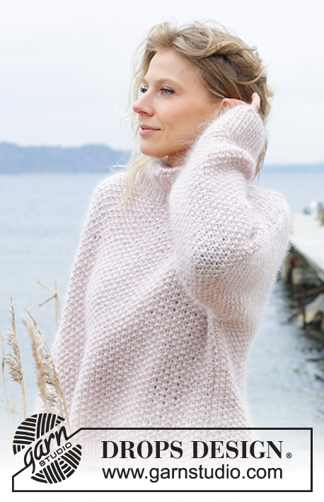 Dandelion Wish Sweater / DROPS 243-16 - Knitted oversized sweater in 1 strand DROPS Air and 2 strands DROPS Kid-Silk. The piece is worked bottom up, with moss stitch and high neck. Sizes XS - XXL.
