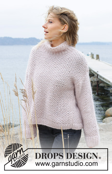 Dandelion Wish Sweater / DROPS 243-16 - Knitted oversized sweater in 1 strand DROPS Air and 2 strands DROPS Kid-Silk. The piece is worked bottom up, with moss stitch and high neck. Sizes XS - XXL.