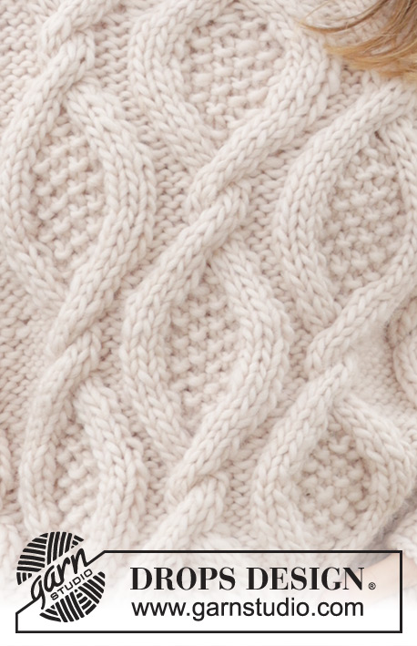 Cable Beach Sweater / DROPS 243-23 - Gebreide oversized trui in DROPS Snow. Het werk wordt van boven naar beneden gebreid met kabels, split in de zijkanten en dubbele halsrand. Maten S - XXXL.