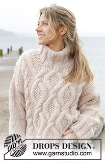Cable Beach Sweater / DROPS 243-23 - Gebreide oversized trui in DROPS Snow. Het werk wordt van boven naar beneden gebreid met kabels, split in de zijkanten en dubbele halsrand. Maten S - XXXL.