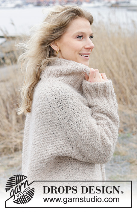 Outdoor Escape Sweater / DROPS 243-24 - Knitted jumper in DROPS Alpaca Bouclé and DROPS Brushed Alpaca Silk. The piece is worked top down with European/diagonal shoulders, moss stitch, high neck and split in sides. Sizes S - XXXL.