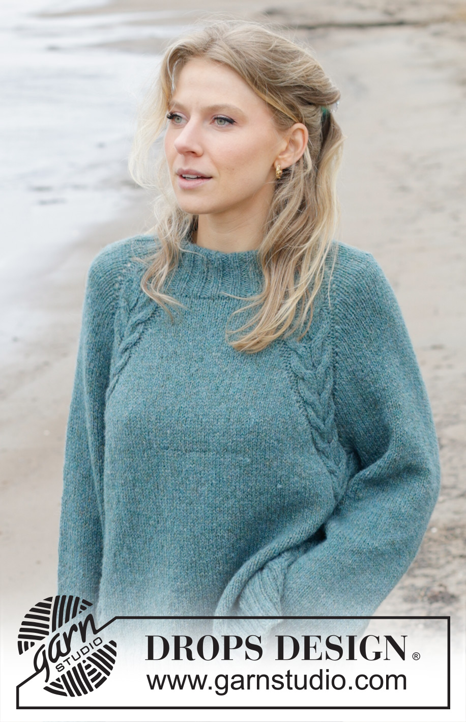 Emerald Lake Sweater / DROPS 244-12 - Strikket bluse i DROPS Sky. Arbejdet strikkes oppefra og ned med høj hals, raglan, snoninger og slids i siderne. Størrelse XS - XXL.
