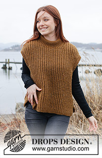 Caramel Ridge / DROPS 244-19 - Gebreide top in DROPS Alaska. Het werk wordt van onder naar boven gebreid, met Engelse patentsteek en split in de zijkanten. Maten S - XXXL.