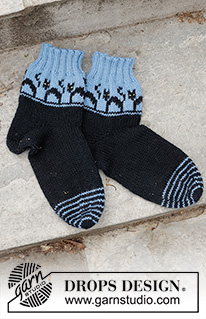 Spooky Evening Socks / DROPS 244-45 - Knitted socks in DROPS Karisma. The piece is worked from the toe upwards, with a multicolored pattern with cats and wedge heel. Sizes 35-43 = US 4 ½ - 12 1/2. Theme: Halloween.
