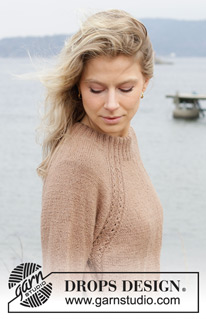 Spill the Beans / DROPS 244-5 - Gebreide trui in DROPS Alpaca. Het werk wordt van boven naar beneden gebreid met dubbele halsrand, raglan en kabels. Maten S - XXXL.