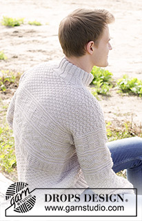Lines in the Sand / DROPS 246-12 - Gebreide trui voor heren in DROPS Alaska of DROPS Big Merino. Het werk wordt van onder naar boven gebreid met reliëfpatroon en dubbele halsrand. Maten S - XXXL.