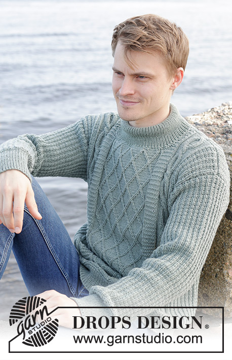 Ocean Ropes / DROPS 246-2 - Gebreide trui voor heren in DROPS Merino Extra Fine. Het werk wordt van onder naar boven gebreid met reliëfpatroon, kabels, ingenaaide mouwen en dubbele halsrand. Maten S - XXXL.