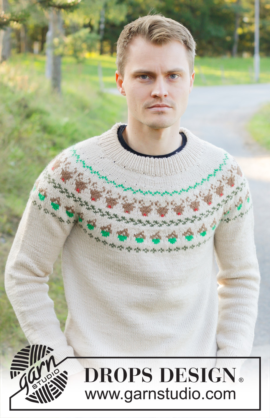 Reindeer Dance Sweater / DROPS 246-42 - Miehen ylhäältä alas neulottu pusero DROPS Daisy-langasta. Työssä on kaksinkertainen pääntien reunus, kaarroke, kirjoneuletta ja porokuvioita. Koot S - XXXL.