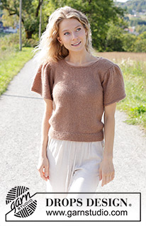 Brown Butterflies Top / DROPS 248-20 - Knitted sweater with short sleeves in DROPS Alpaca and DROPS Kid-Silk. The piece is worked bottom up with round neck + I-cord and short, puffed sleeves. Sizes S - XXXL.