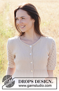 Sand Cove Cardigan / DROPS 248-28 - Propínací svetr s copánky, krajkovým vzorem a krátkým rukávem pletený zdola nahoru z příze DROPS Safran. Velikost S - XXXL.
