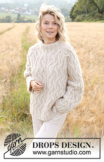 Sand Trails / DROPS 248-3 - Strikket bluse i DROPS Air og DROPS Brushed AlpacaSilk. Arbejdet strikkes nedefra og op med raglan, snoninger og dobbelt halskant. Størrelse S - XXXL.