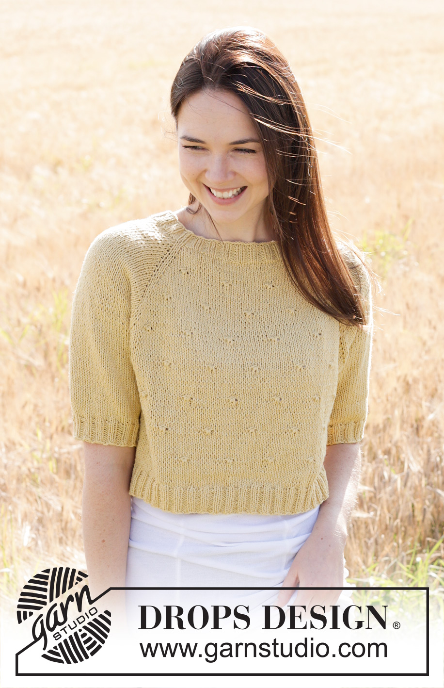 Dandelion Heart / DROPS 249-19 - Knitted short-sleeved jumper in DROPS Belle. The piece is worked top down with raglan and relief-pattern. Sizes S - XXXL.