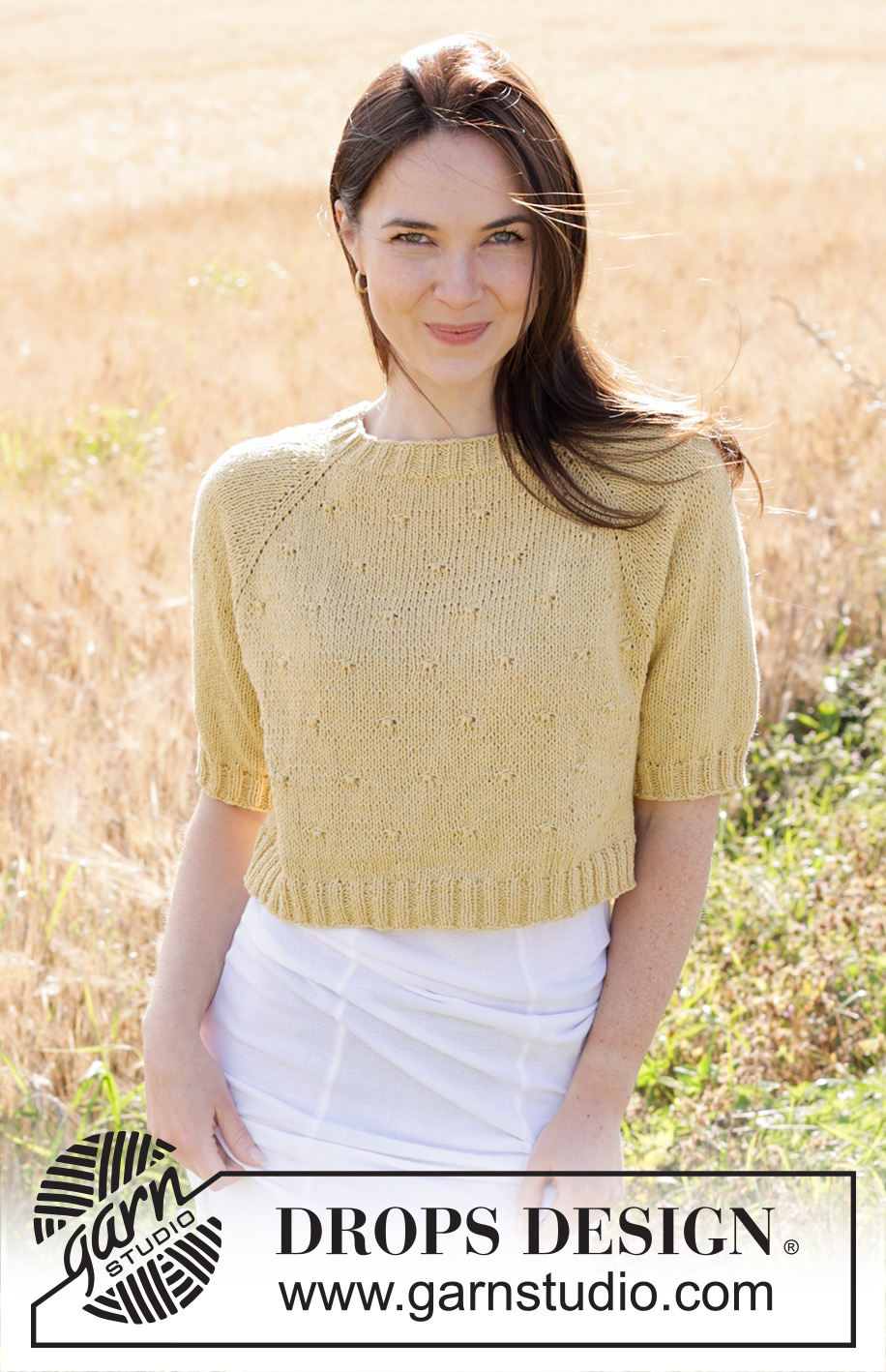 Dandelion Heart / DROPS 249-19 - Knitted short-sleeved jumper in DROPS Belle. The piece is worked top down with raglan and relief-pattern. Sizes S - XXXL.