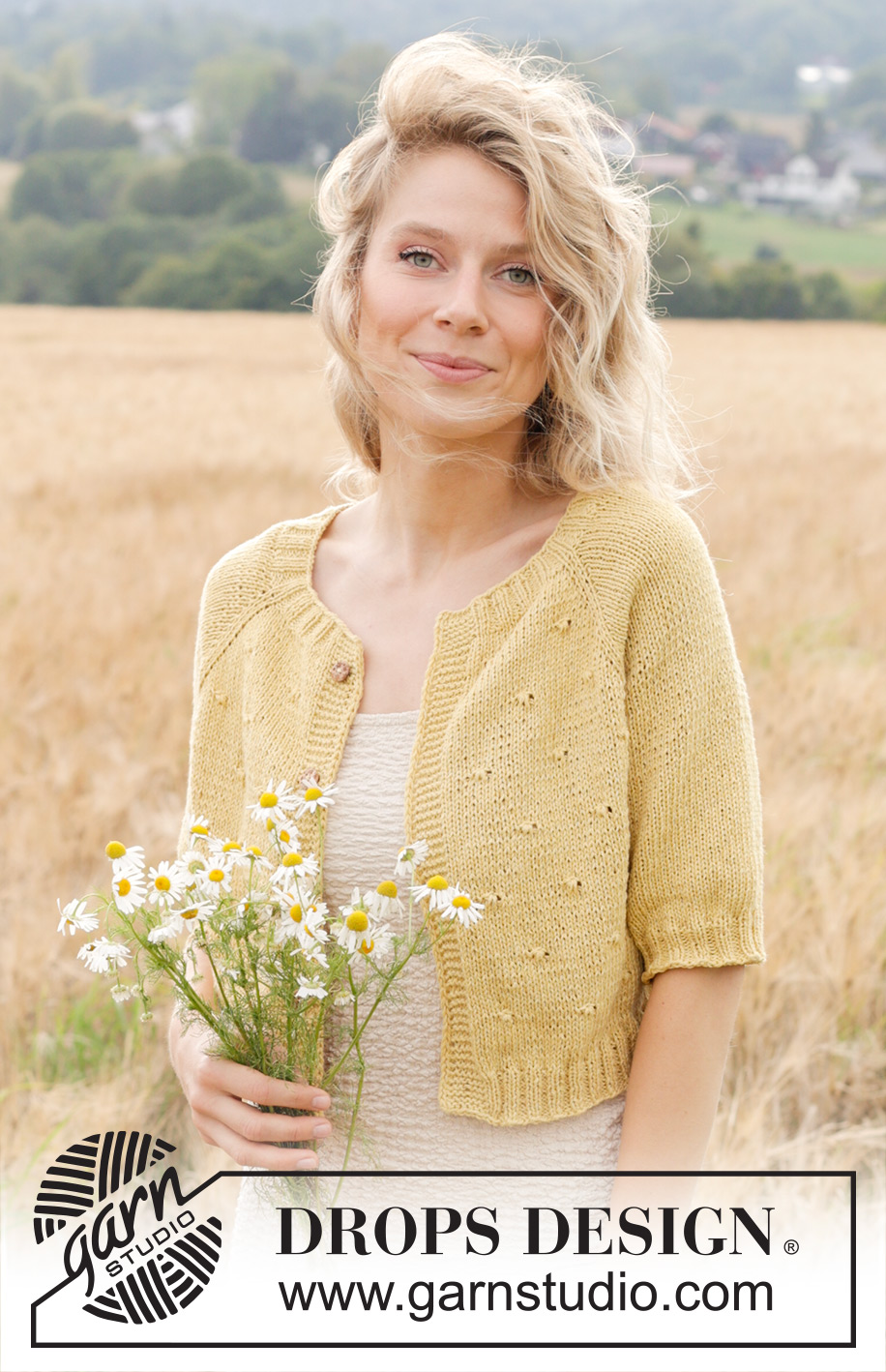 Dandelion Heart Cardigan / DROPS 249-20 - Knitted short-sleeved jacket in DROPS Belle. The piece is worked top down with raglan, relief-pattern and I-cord. Sizes S - XXXL.