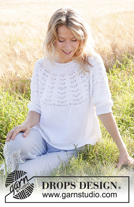 Peace Dove / DROPS 249-21 - Gebreide trui met ¾ mouwen in DROPS Belle of DROPS Cotton Light. Het werk wordt van boven naar beneden gebreid met ronde pas en golfpatroon op de pas. Maat: S - XXXL