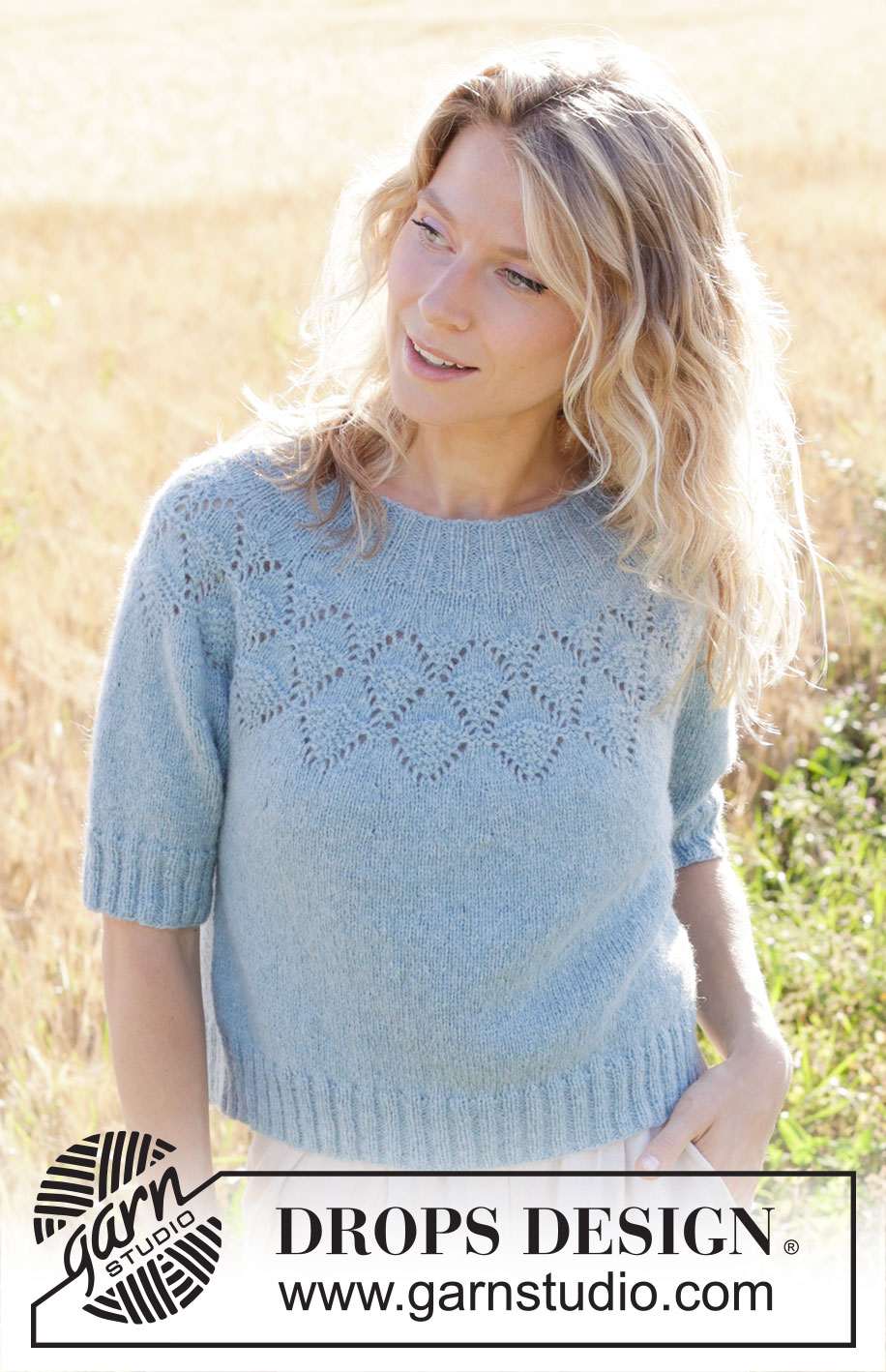 Blueberry Leaf / DROPS 249-9 - Knitted sweater in DROPS Sky or DROPS Merino Extra Fine. Piece is knitted top down with round yoke, lace pattern and short sleeves. Size: S - XXXL