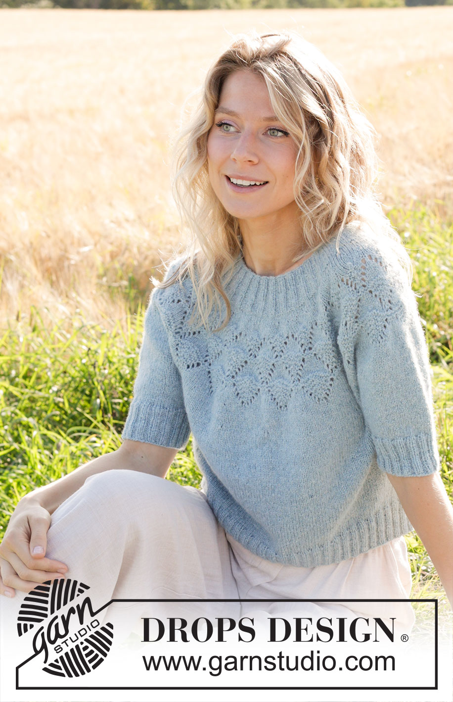 Blueberry Leaf / DROPS 249-9 - Knitted sweater in DROPS Sky or DROPS Merino Extra Fine. Piece is knitted top down with round yoke, lace pattern and short sleeves. Size: S - XXXL