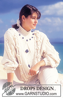 DROPS 25-19 - DROPS jumper with bobbles and cables in “Muskat ”. 