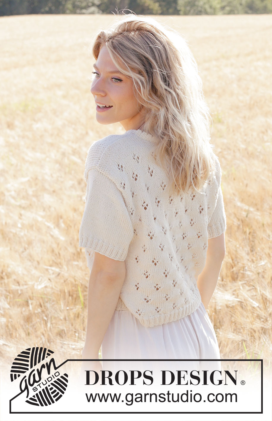 White Spring / DROPS 250-7 - Top lavorato ai ferri in DROPS Cotton Merino. Lavorato dall’alto in basso con motivo traforato e maniche corte. Taglie: XS – XXXL.