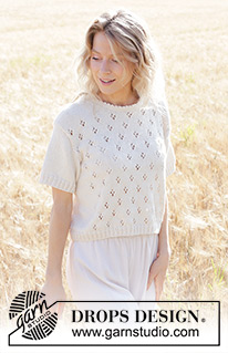 White Spring / DROPS 250-7 - Top lavorato ai ferri in DROPS Cotton Merino. Lavorato dall’alto in basso con motivo traforato e maniche corte. Taglie: XS – XXXL.