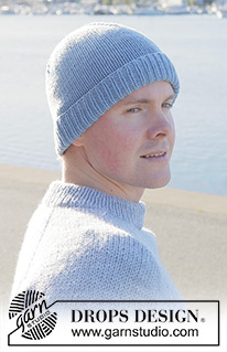 Blue Frost Hat / DROPS 251-13 - Miehen alhaalta ylös neulottu myssy DROPS Big Merino -langasta. Työssä on sileää neuletta ja taitereuna.