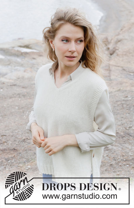 November Novelty Vest / DROPS 252-28 - Knitted vest in DROPS Air. The piece is worked bottom up, with V-neck, diagonal shoulders and split in sides. Sizes XS - XXL.