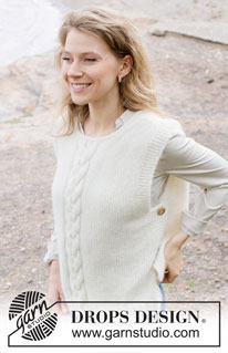 Snowfall Vest / DROPS 252-31 - Gebreide top in DROPS Air. Het werk wordt van onder naar boven gebreid met kabels, diagonale schouders en split in de zijkanten. Maten XS - XXL.