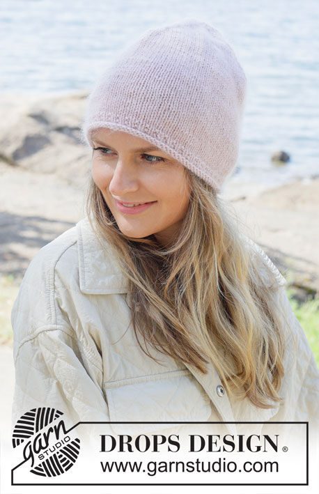 Blushing Horizon Hat / DROPS 253-11 - Knitted hat in DROPS Daisy and DROPS Kid-Silk or DROPS Karisma and DROPS Kid-Silk.. The piece is worked bottom up with a rolled edge. Sizes S - XL.