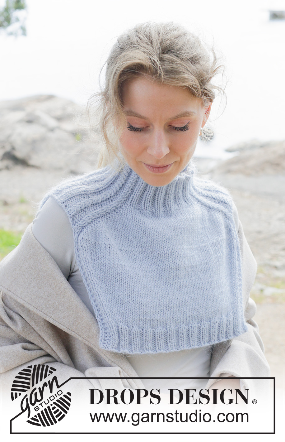 City Confidential / DROPS 253-4 - Knitted neck warmer in DROPS Merino Extra Fine and DROPS Kid-Silk or DROPS Karisma and DROPS Kid-Silk. Piece is knitted top down with saddle shoulders and cables.