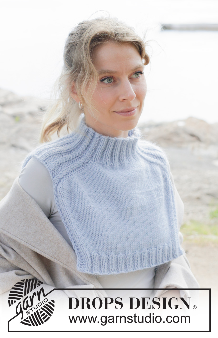 City Confidential / DROPS 253-4 - Knitted neck warmer in DROPS Merino Extra Fine and DROPS Kid-Silk or DROPS Karisma and DROPS Kid-Silk. Piece is knitted top down with saddle shoulders and cables.