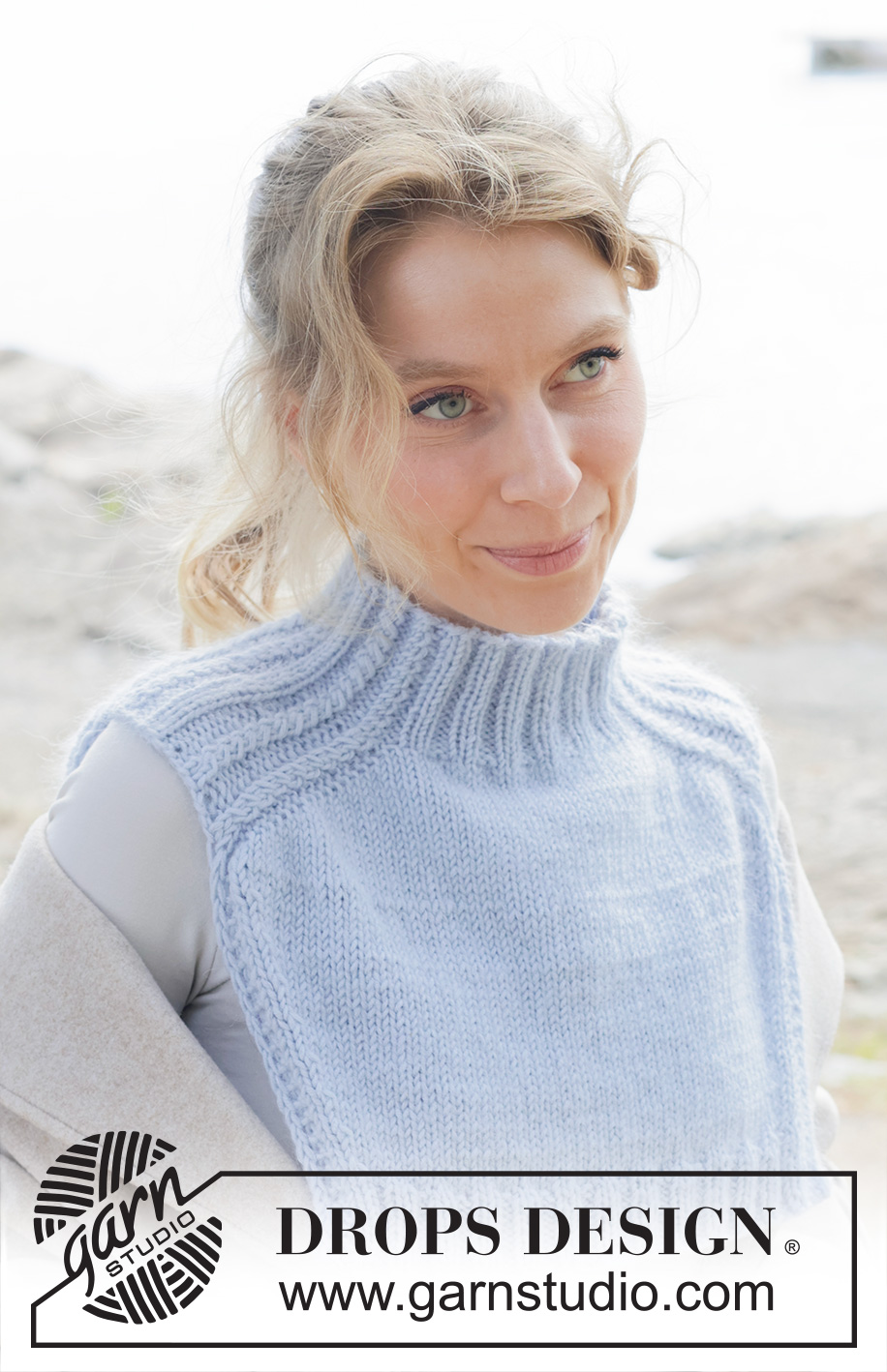 City Confidential / DROPS 253-4 - Knitted neck warmer in DROPS Merino Extra Fine and DROPS Kid-Silk or DROPS Karisma and DROPS Kid-Silk. Piece is knitted top down with saddle shoulders and cables.