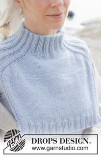 City Confidential / DROPS 253-4 - Knitted neck warmer in DROPS Merino Extra Fine and DROPS Kid-Silk or DROPS Karisma and DROPS Kid-Silk. Piece is knitted top down with saddle shoulders and cables.