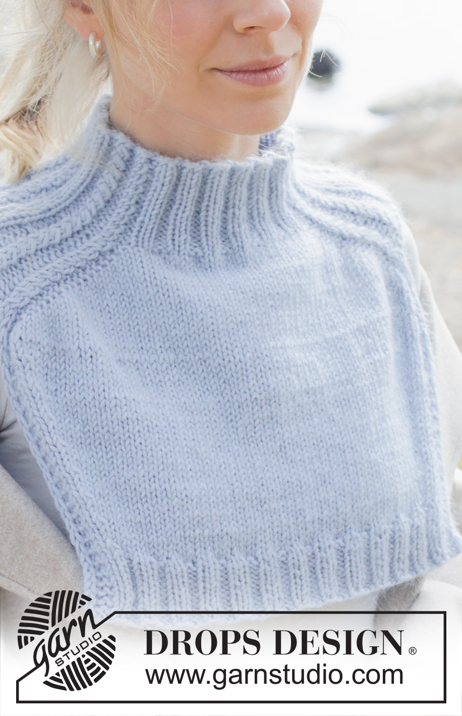City Confidential / DROPS 253-4 - Knitted neck warmer in DROPS Merino Extra Fine and DROPS Kid-Silk or DROPS Karisma and DROPS Kid-Silk. Piece is knitted top down with saddle shoulders and cables.