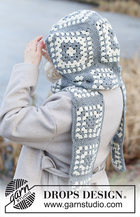 Granny Square Hood / DROPS 253-59 - Gehäkelter Kapuzenschal in DROPS Big Merino. Die Arbeit wird mit Granny Squares gehäkelt und zusammengenäht. Einheitsgröße.