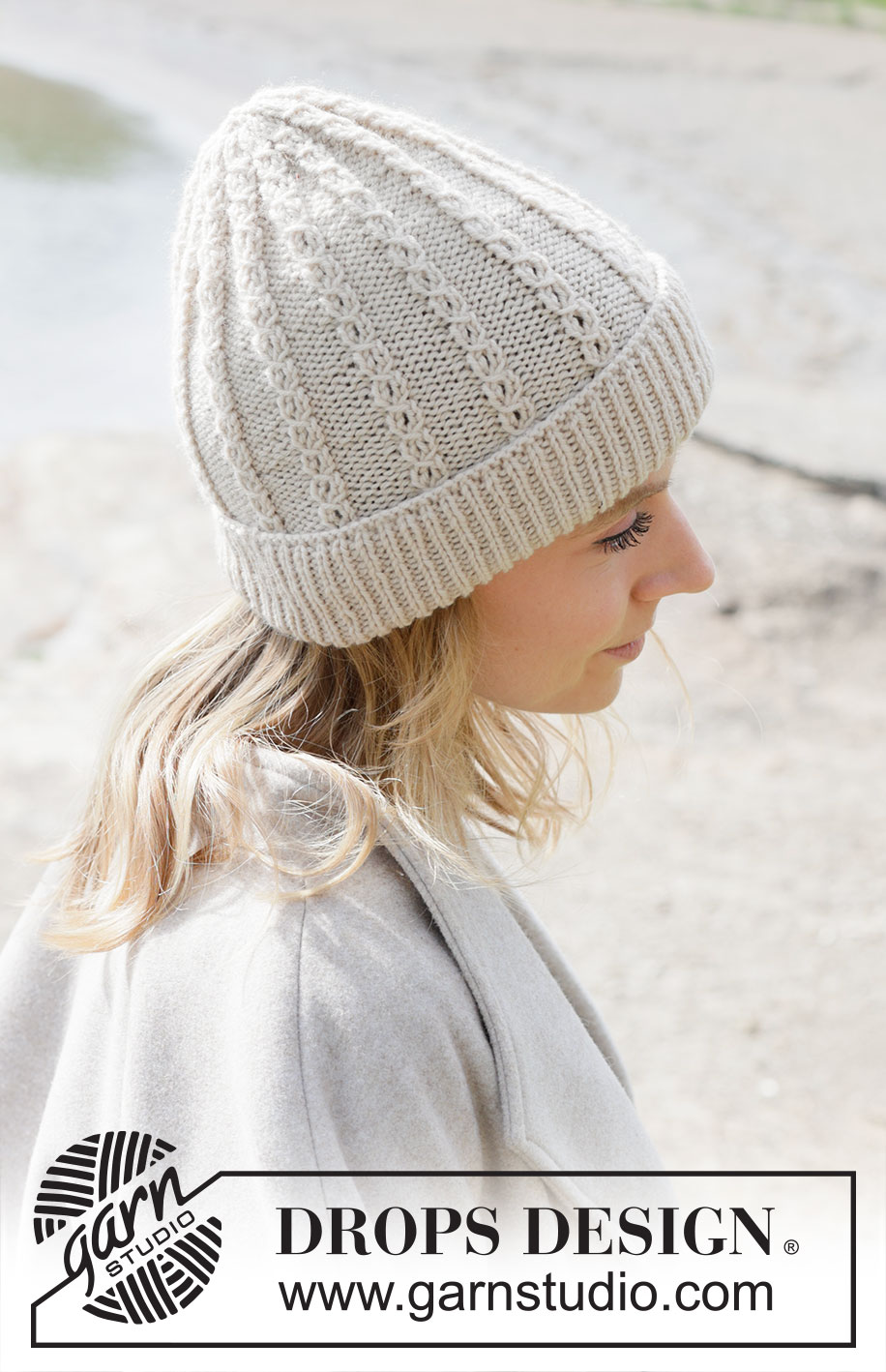 Rising Tide Hat / DROPS 253-7 - Knitted hat in DROPS Daisy or DROPS Puna. The piece is worked bottom up with lace pattern and fold-up.
