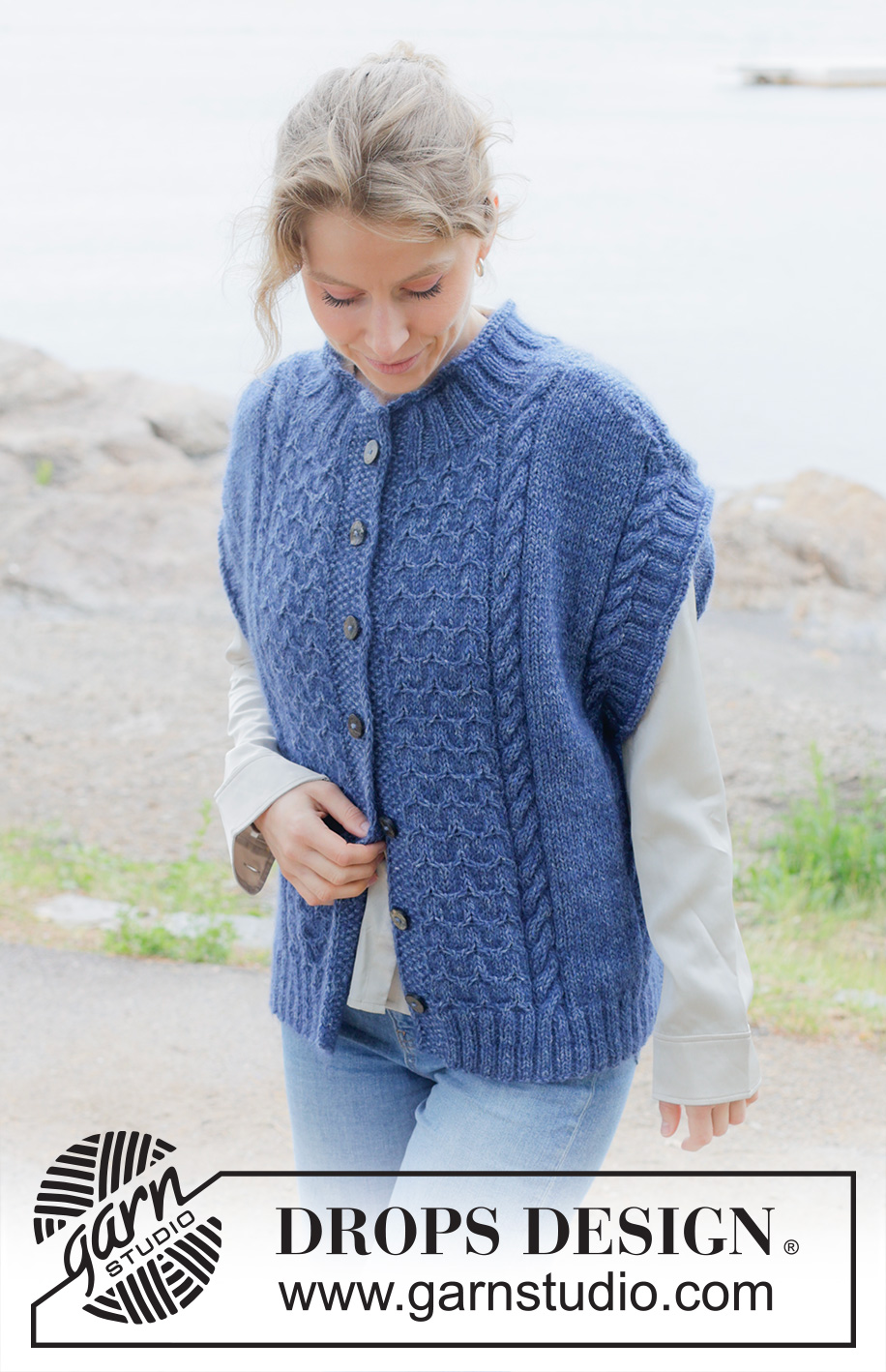Stormy Ocean Vest / DROPS 254-25 - Knitted over-sized vest with opening in DROPS Soft Tweed and DROPS Kid-Silk. The piece is worked bottom up with cables, diagonal shoulders, round neck, rolled edges and I-cord. Sizes S - XXXL.