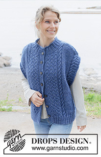Stormy Ocean Vest / DROPS 254-25 - Knitted over-sized vest with opening in DROPS Soft Tweed and DROPS Kid-Silk. The piece is worked bottom up with cables, diagonal shoulders, round neck, rolled edges and I-cord. Sizes S - XXXL.