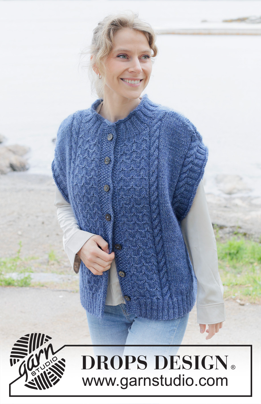 Stormy Ocean Vest / DROPS 254-25 - Knitted over-sized vest with opening in DROPS Soft Tweed and DROPS Kid-Silk. The piece is worked bottom up with cables, diagonal shoulders, round neck, rolled edges and I-cord. Sizes S - XXXL.