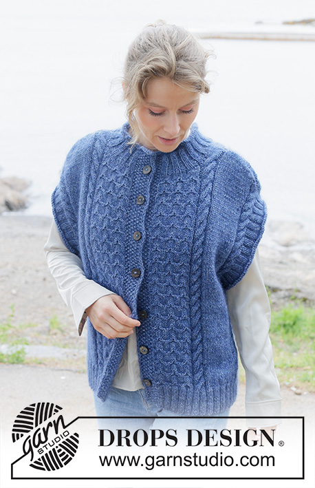 Stormy Ocean Vest / DROPS 254-25 - Knitted over-sized vest with opening in DROPS Soft Tweed and DROPS Kid-Silk. The piece is worked bottom up with cables, diagonal shoulders, round neck, rolled edges and I-cord. Sizes S - XXXL.