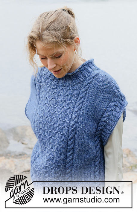 Stormy Ocean Vest / DROPS 254-26 - Alhaalta ylös neulottu oversize-liivi DROPS Soft Tweed- ja DROPS Kid-Silk -langoista. Työssä on palmikoita, viistotut olkapäät, pyöreä pääntie ja rullareunus. Koot S-XXXL.