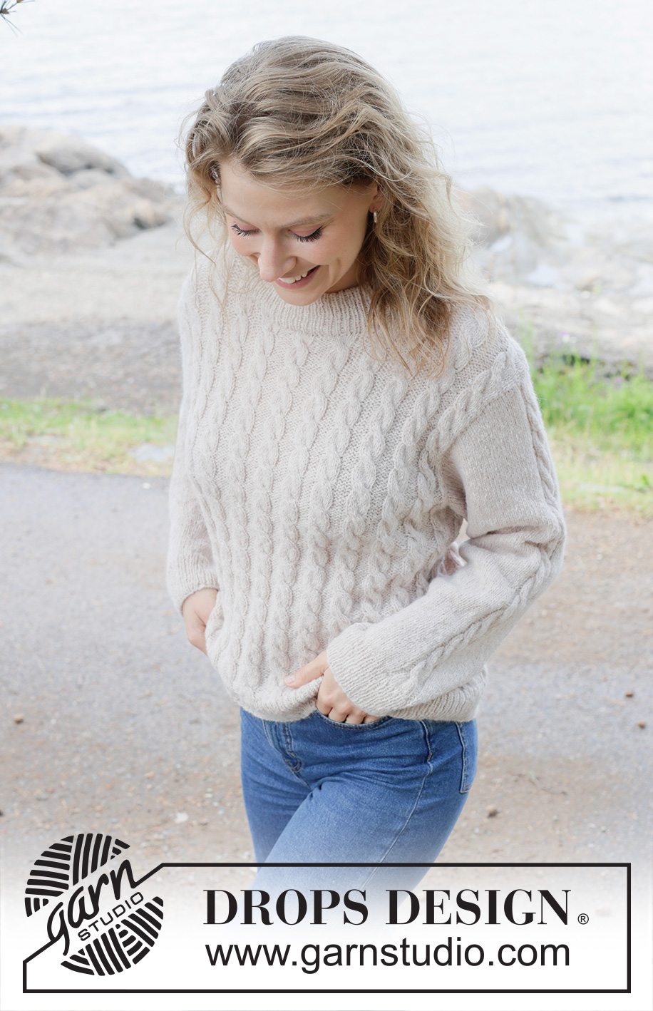 Cable Mirage / DROPS 255-28 - Knitted jumper in DROPS Sky. The piece is worked bottom up with cables. Sizes S - XXXL.