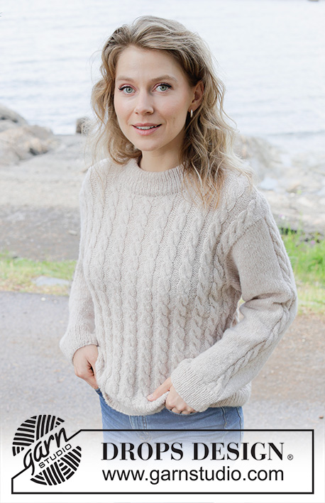 Cable Mirage / DROPS 255-28 - Knitted jumper in DROPS Sky. The piece is worked bottom up with cables. Sizes S - XXXL.